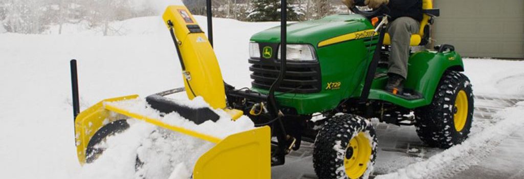 How do you use a snow plow on a tractor
