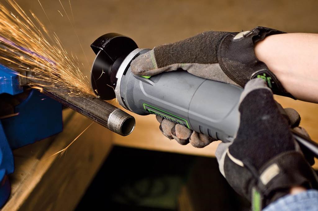 Close-up of Genesis GCOT335 cutoff tool with ergonomic grip and safety guard