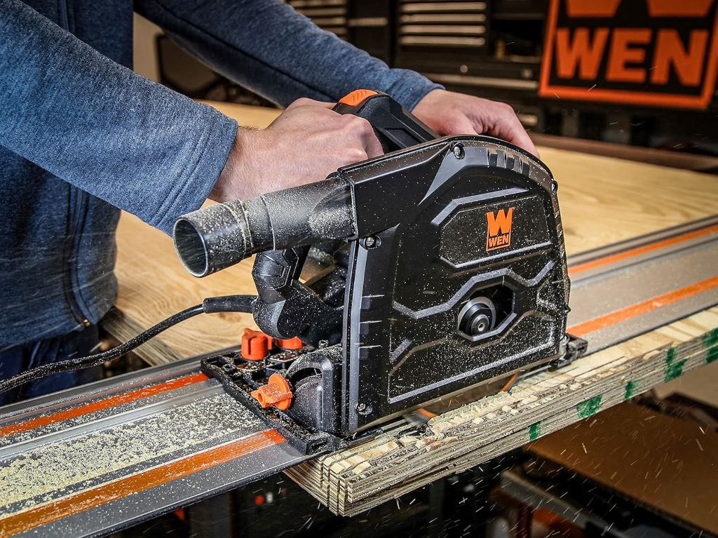 Close-up of WEN track saw in action, showing precision cutting.