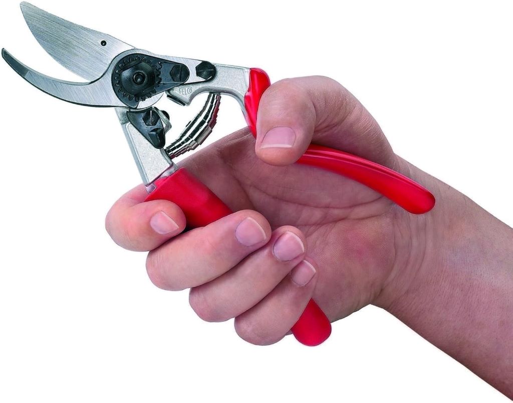 Felco F7 hand pruners with aluminum handles and bypass blade for gardening