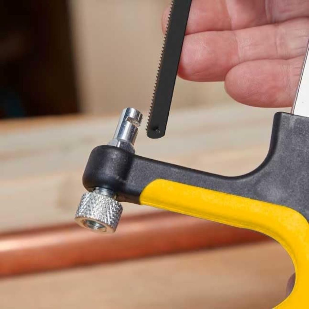 Close-up of Hanpex mini hacksaw replacement blades, fine finish 24 TPI set.