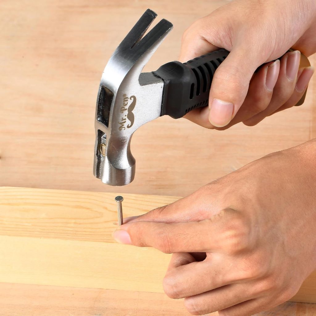 Compact Mr. Pen camping hammer with magnetic head, stubby grip, and versatile design.