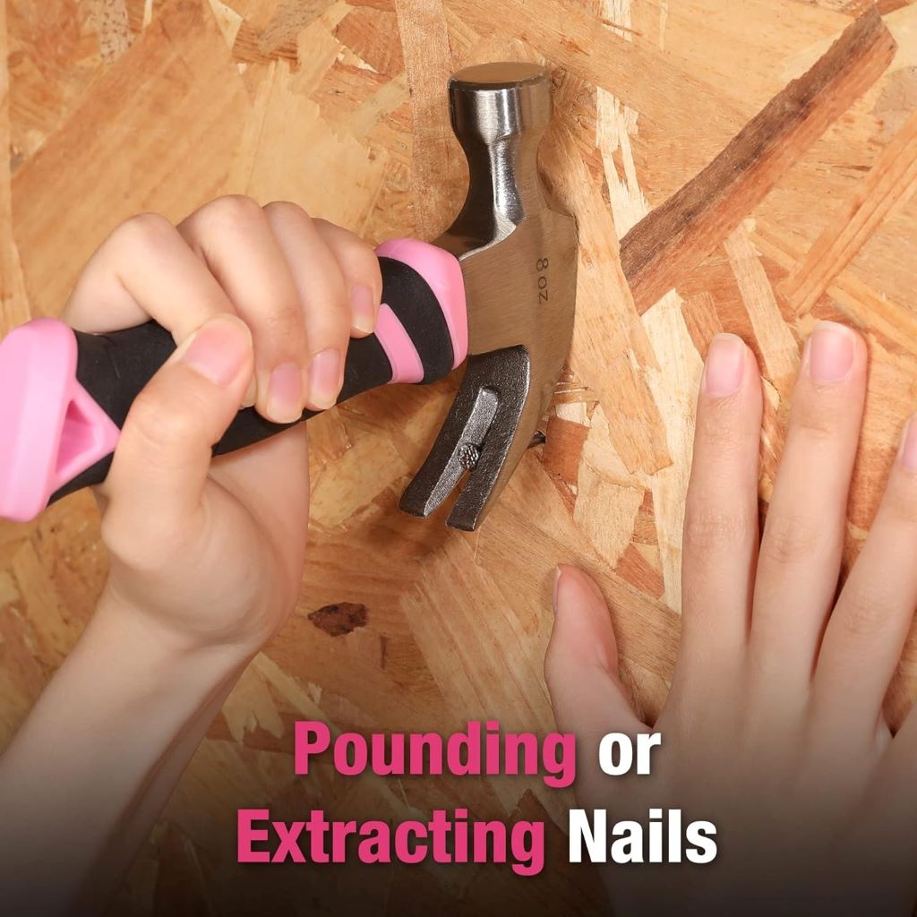 Lightweight pink fiberglass hammer by WORKPRO displayed on a workbench with DIY tools