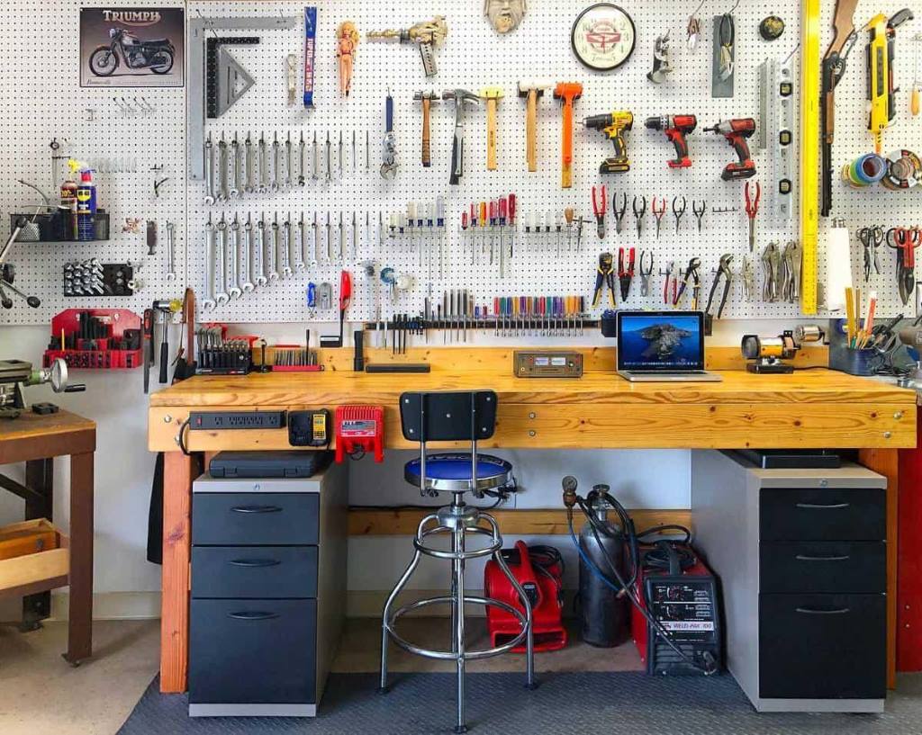 Organized automotive repair tools on a garage workbench