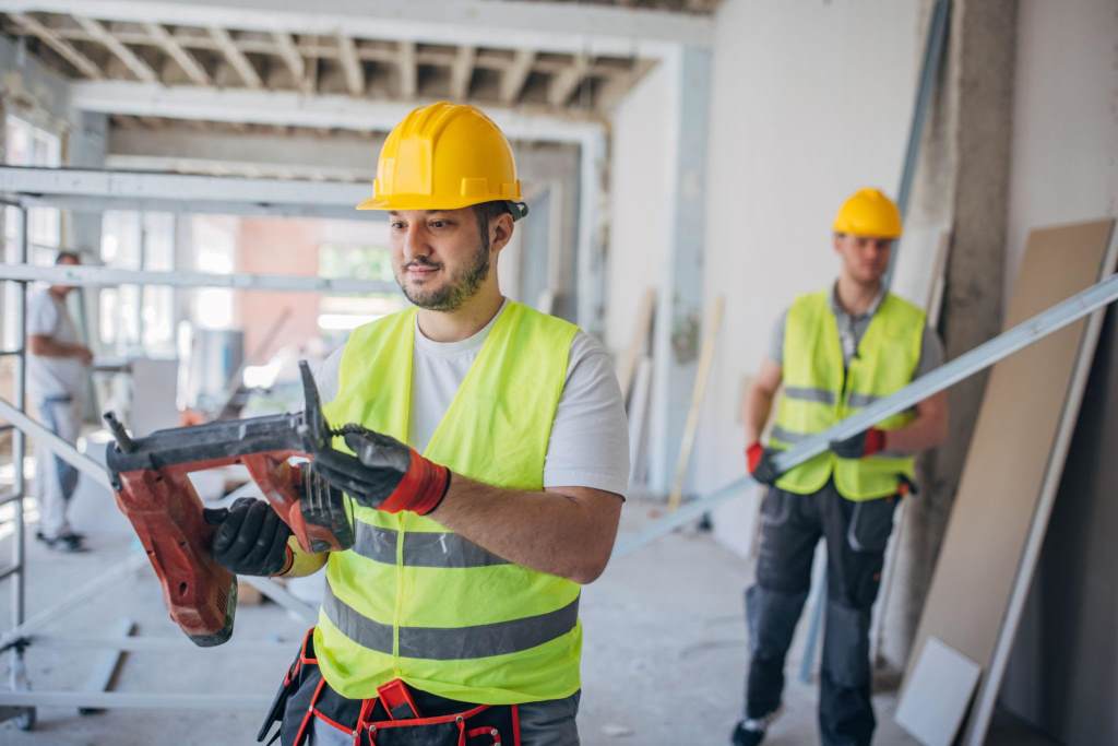 Professionalism at Work Construction Worker with Electric Nail gun