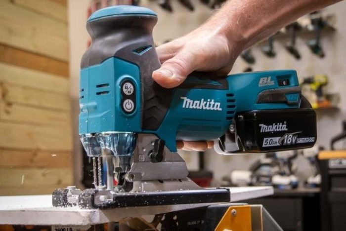 DIY enthusiast using a cordless jigsaw for home improvement projects in Texas