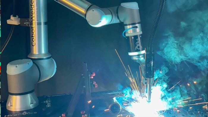 Robotic welding arm demonstrating live metalworking technology at FABTECH 2026 Las Vegas trade show