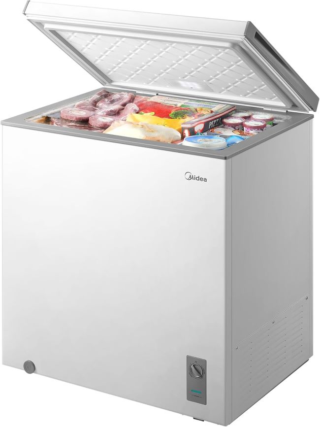 Midea MERC07C4BAWW chest freezer with removable storage basket in a New York home