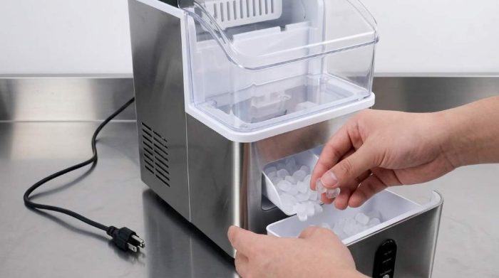 Running a cleaning cycle on a countertop ice maker