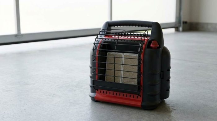 Inspecting ceramic burner tiles on Mr Heater 18000 BTU heater